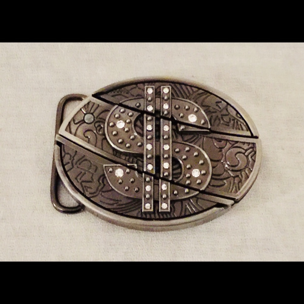 Dollar sign belt buckle with small knife